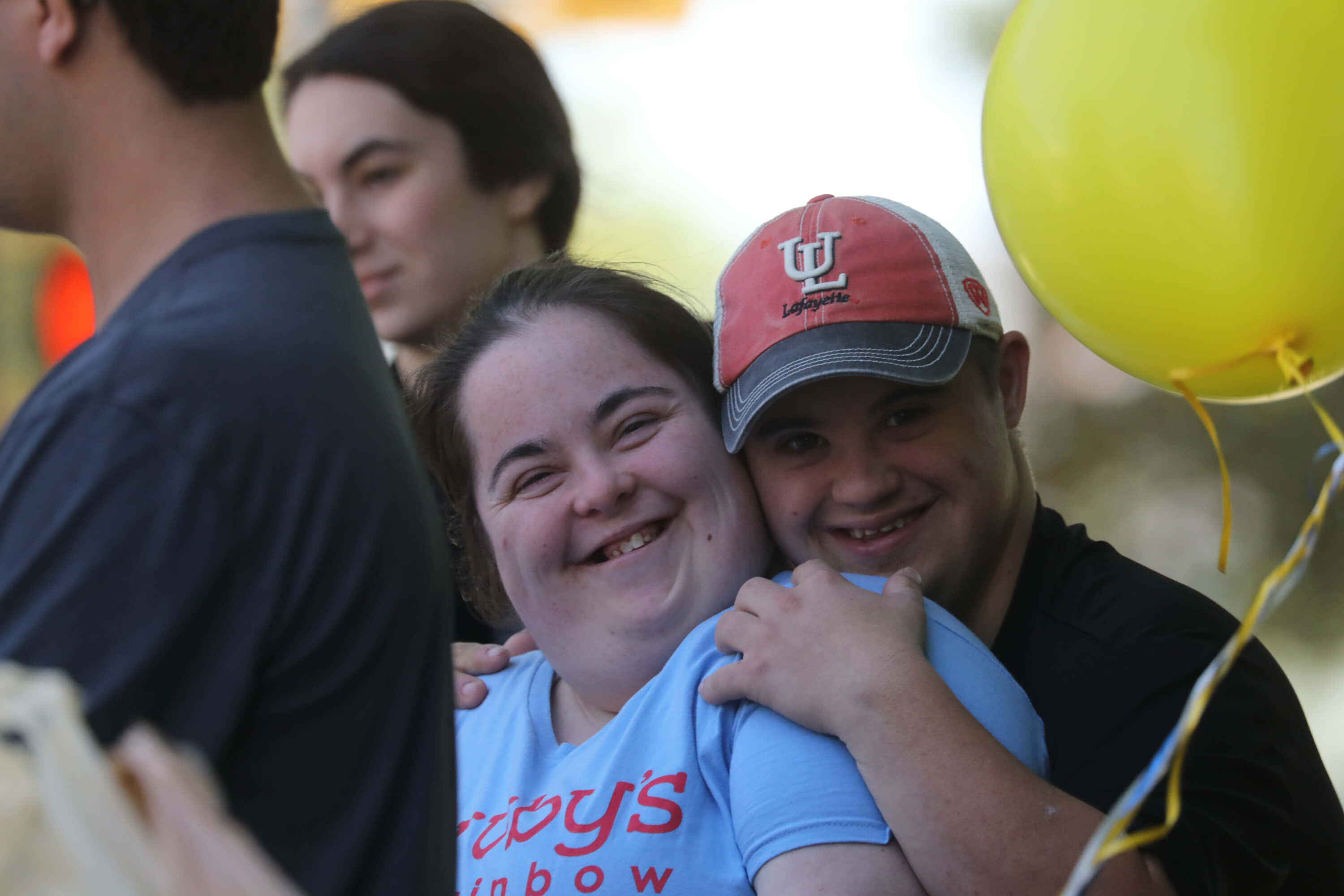Two people smiling together.