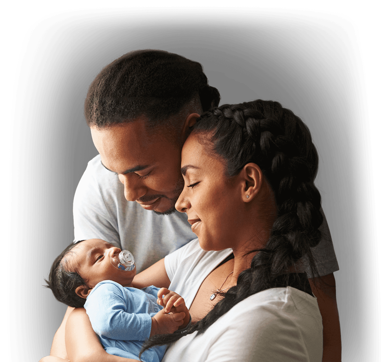 Parents holding a newborn