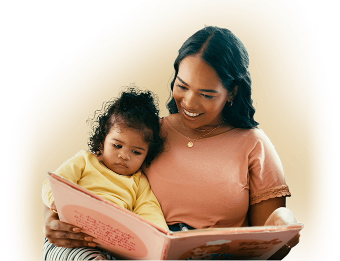 Mother reading to young daughter
